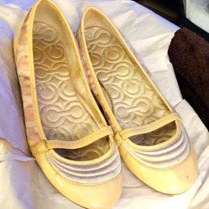 Cream coach shoes